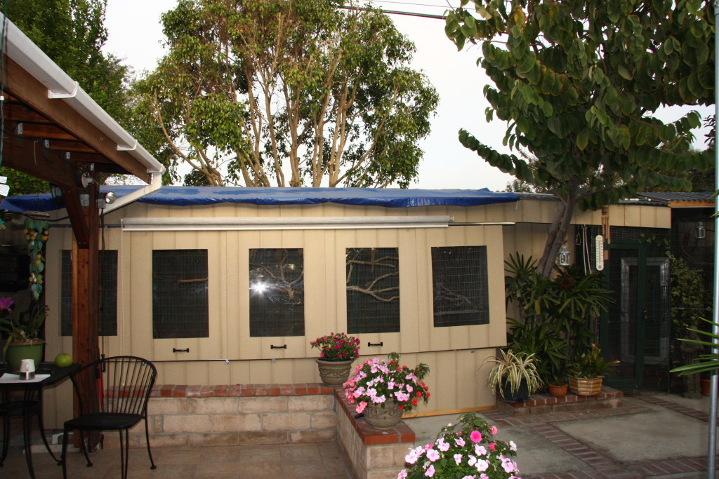 Aviary set up for winter front panels slides out