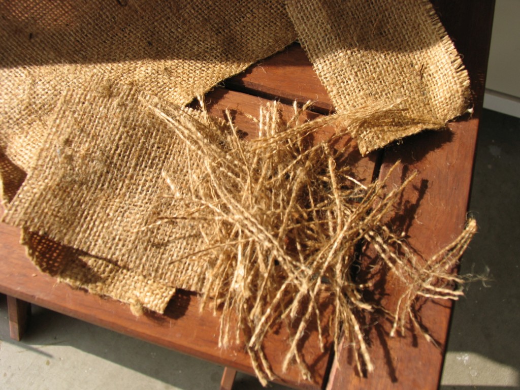 Burlap is used during colder season for added warmth